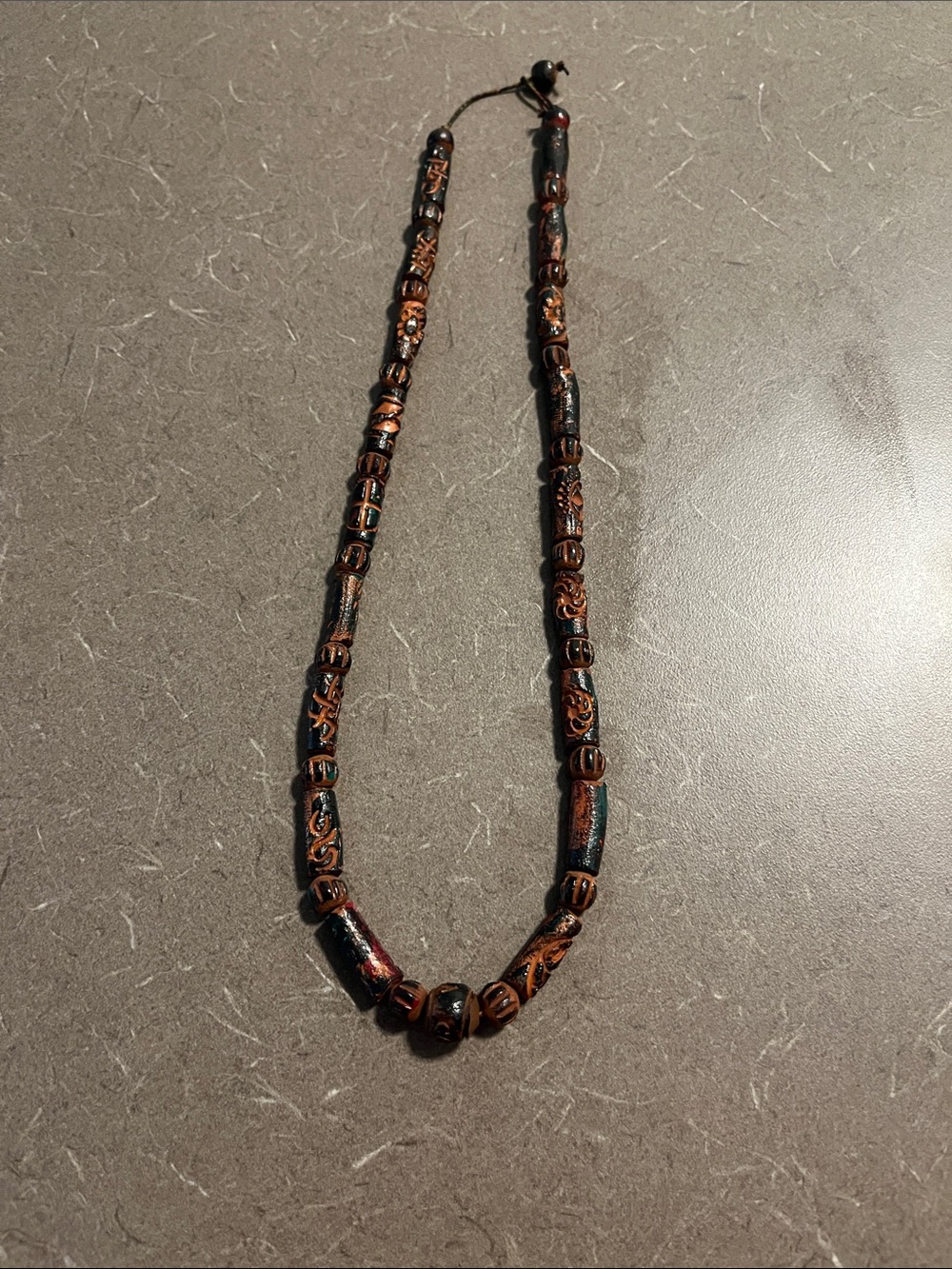 Boho/tribal style wood & glazed carved necklace . 10”